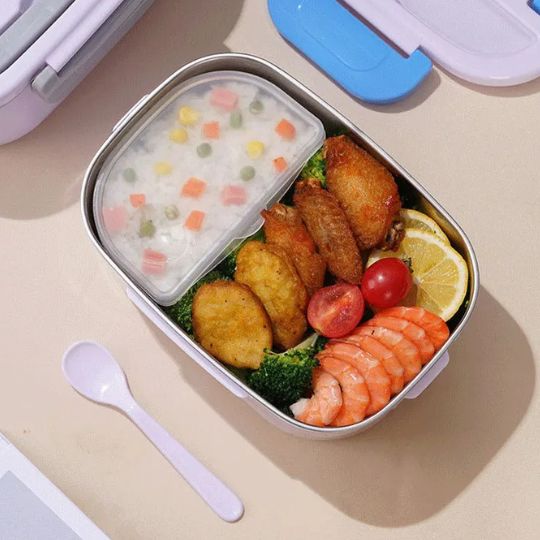lunch box chauffante en inox pleine d'aliment