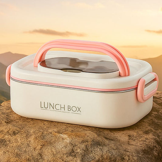 boite à repas rose sur un rocher