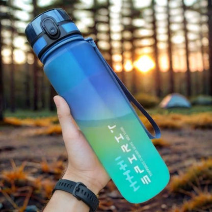 gourde-1-litre-bleu-et-vert-pendant-coucher-de-soleil