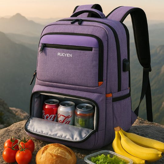 sac à dos sotherme violet au sommet d'une montagne sur un rocher