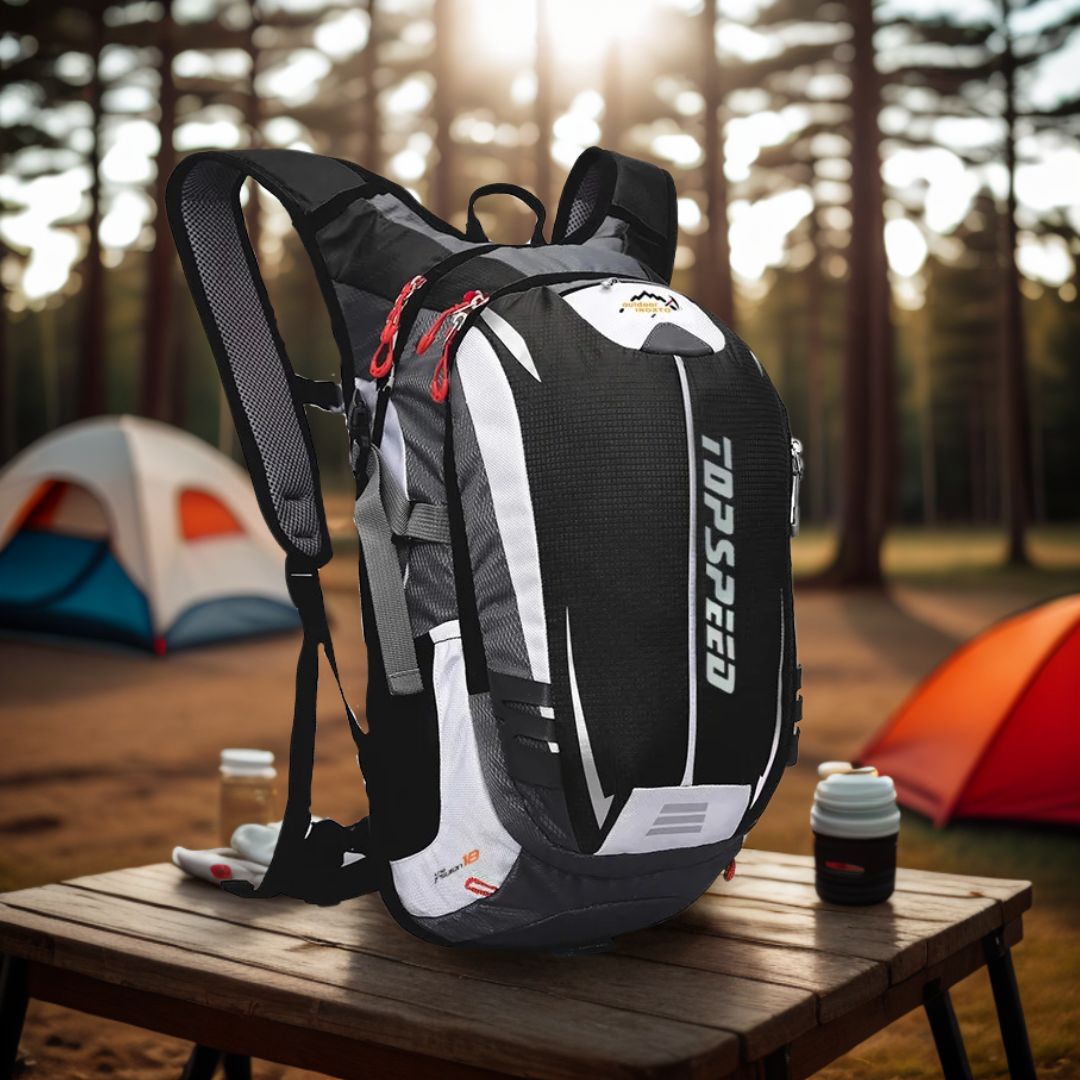 sac-a-dos-sport-noir-sur-une-table-de-camping