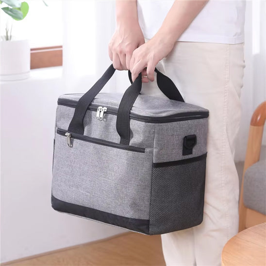 sac-isotherme-gris-tenu-par-la-sangle